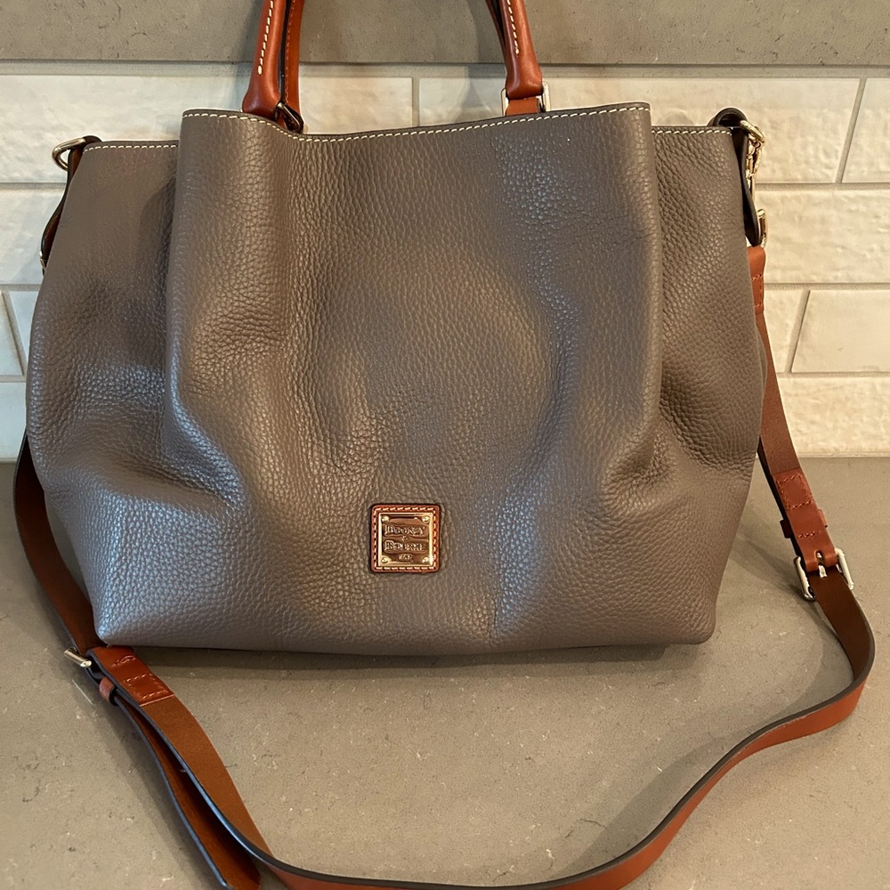 Dooney and Bourke large satchel. Hardly used. Comes with dust bag!